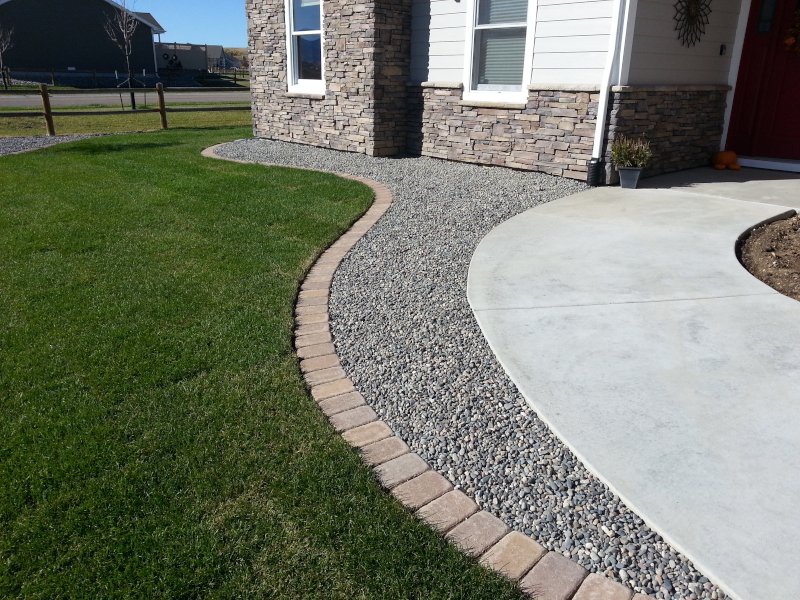 Brick and Stone Landscape Edging by Sheridan Lawn and Landscaping, LLC